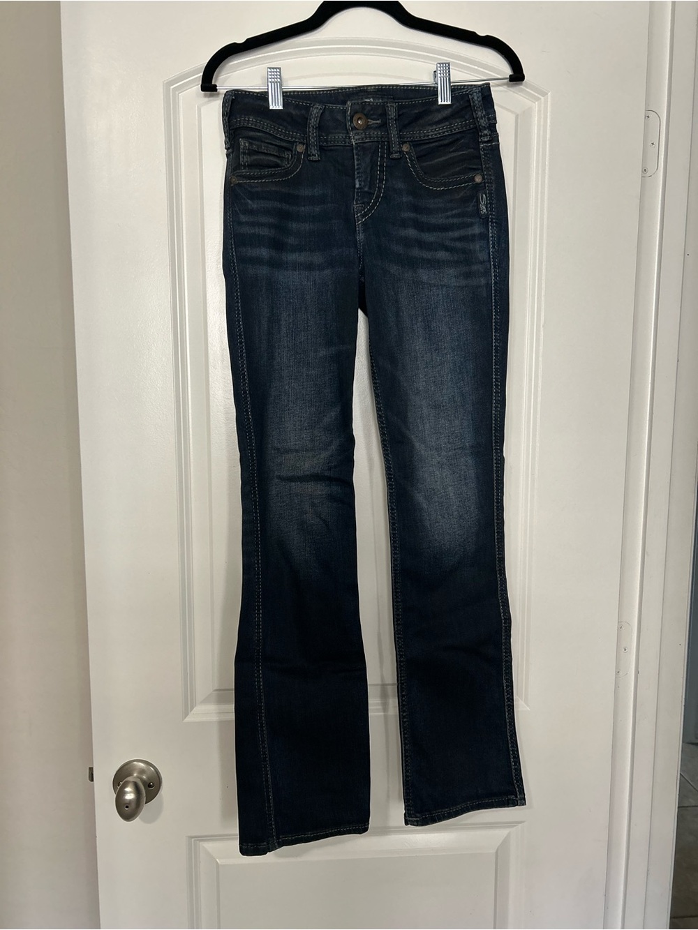 Silver Jeans Dark Blue Flare Jeans with Subtle Fade